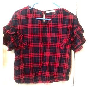 Plaid short sleeve blouse.
